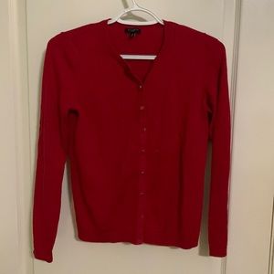 Women’s red long sleeve cardigan.